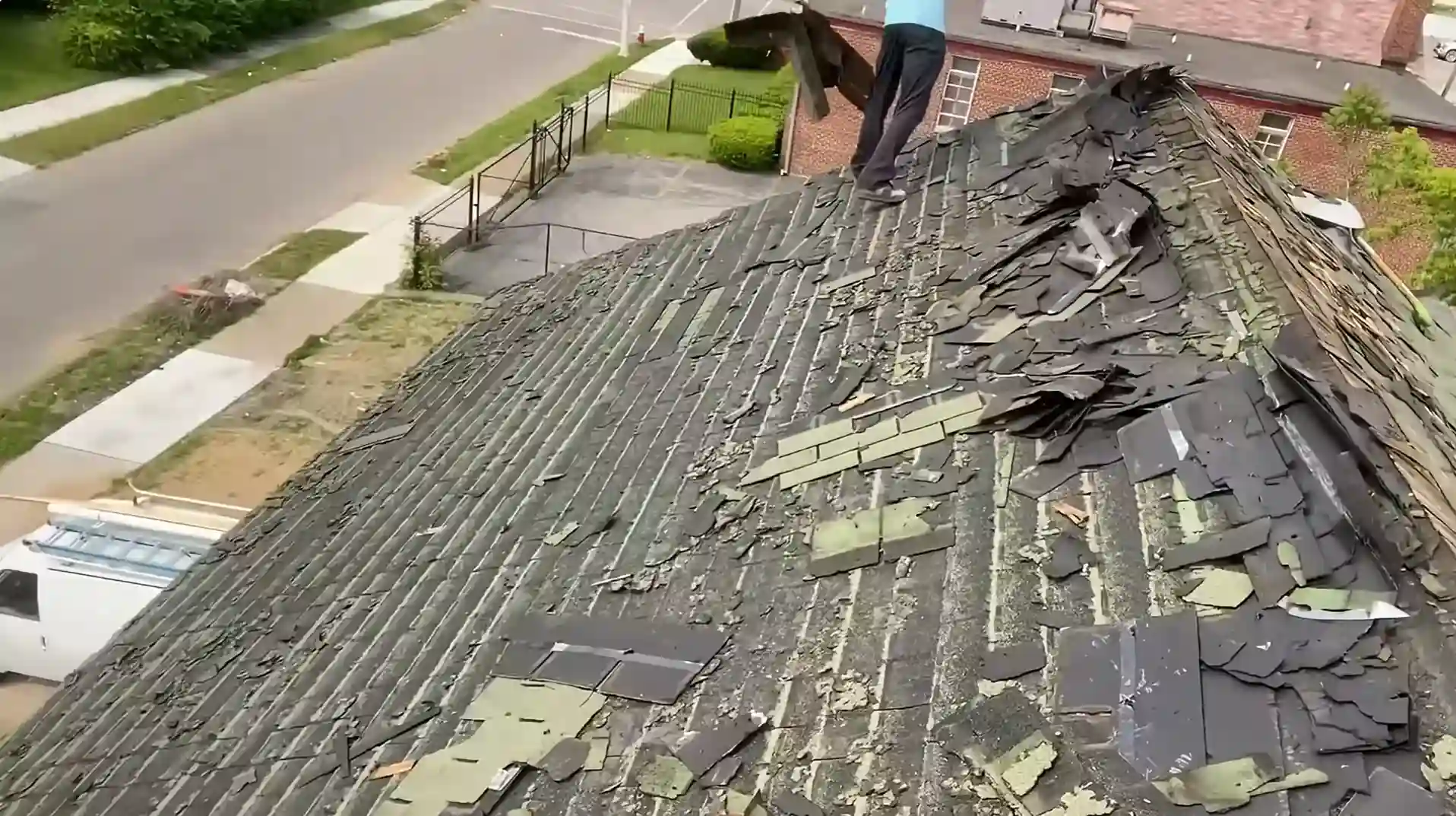Before: Aging and deteriorated asphalt shingles assessed by a local Roofing Contractor Bismarck ND.